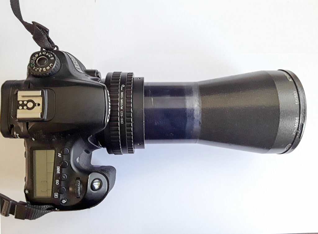 Filmprojector lens op canon camera